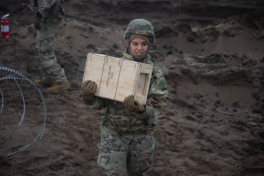 Task Force Provider Soldiers execute a convoy live fire exercise