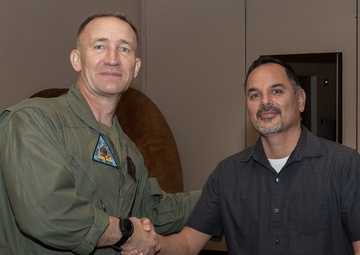 Col. Jared K. Stone presents awards to civilian employees