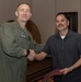 Col. Jared K. Stone presents awards to civilian employees