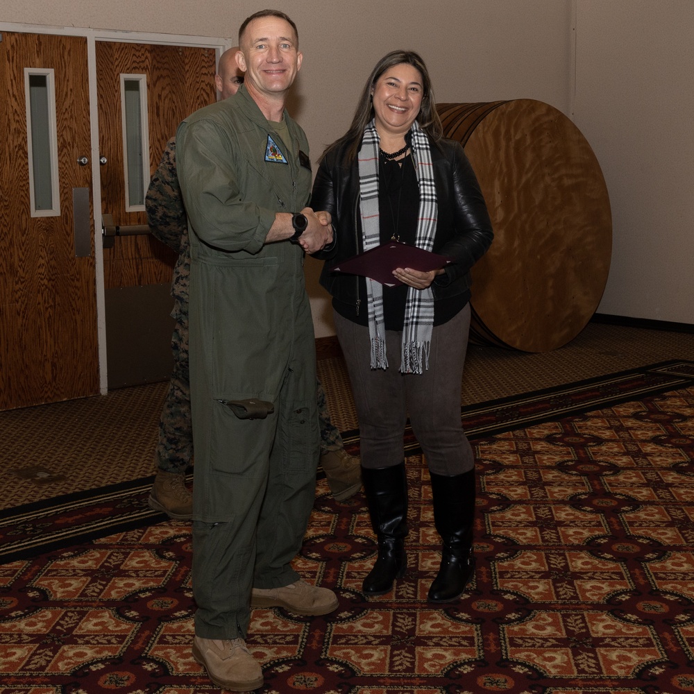 Col. Jared K. Stone presents awards to civilian employees