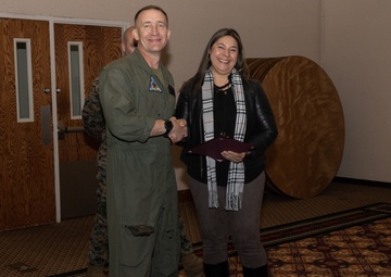 Col. Jared K. Stone presents awards to civilian employees