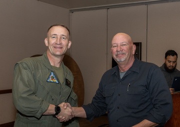 Col. Jared K. Stone presents awards to civilian employees
