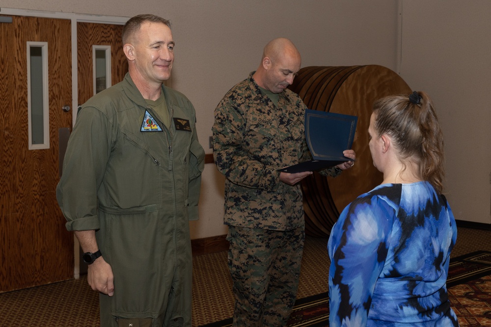 Col. Jared K. Stone presents awards to civilian employees