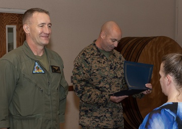 Col. Jared K. Stone presents awards to civilian employees