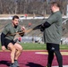U.S. Marines with the Wounded Warrior Regiment and students with the Federal Bureau of Investigation National Academy participate in an annual joint physical training
