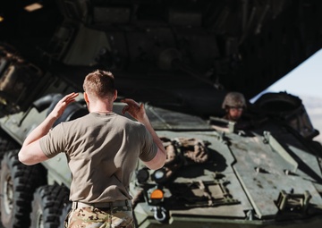 Marines with 3rd LAR unload tactical vehicles off of Air Force C-17 Globemaster III cargo aircraft