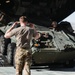 Marines with 3rd LAR unload tactical vehicles off of Air Force C-17 Globemaster III cargo aircraft