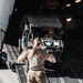 Marines with 3rd LAR unload tactical vehicles off of Air Force C-17 Globemaster III cargo aircraft