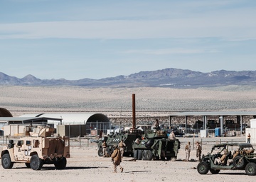 Marines with 3rd LAR unload tactical vehicles off of Air Force C-17 Globemaster III cargo aircraft
