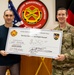 USAG Rheinland-Pfalz leadership recognize employee for commitment to service culture