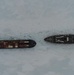 Coast Guard Cutter Polar Star (WAGB 10) escorts supply ships to McMurdo Station, Antarctica