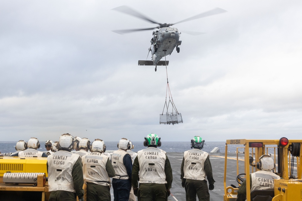 USS America conducts RAS