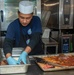 USS Ronald Reagan (CVN 76) Sailors prepare food in the aft galley