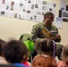 86 AW commander reads to RAB children