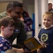 86 AW commander reads to RAB children