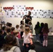 86 AW commander reads to RAB children