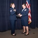 Tech. Sgt. Kristina Bloodgood is presented with medallion at Nevada Air National Guard Base in Reno, Nev.