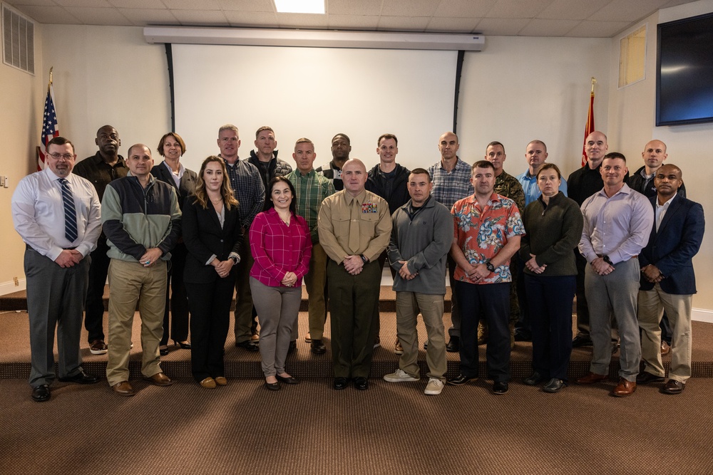 Brig. Gen. Farrell Sullivan poses with the commanding formal schools course