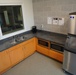 Kitchen area inside new Marine Corps Security Force Regiment (MCSFR) barracks onboard NWS Yorktown