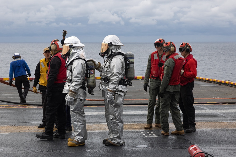 Marines, Sailors conduct flight deck firefighting training aboard USS America