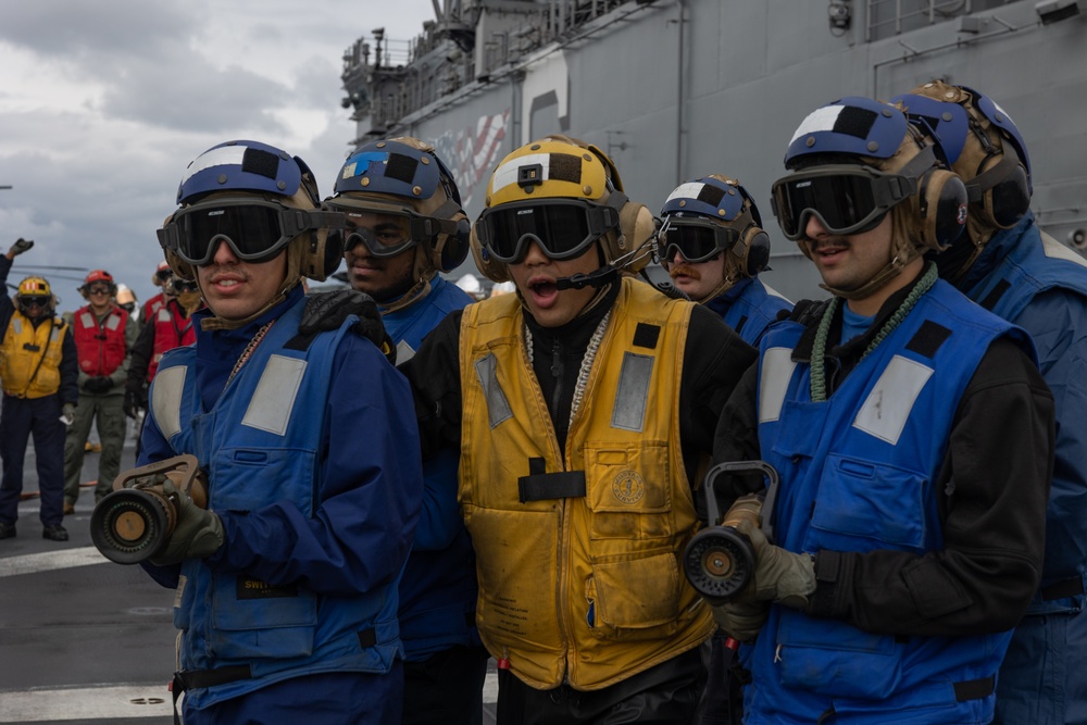 Marines, Sailors conduct flight deck firefighting training aboard USS America