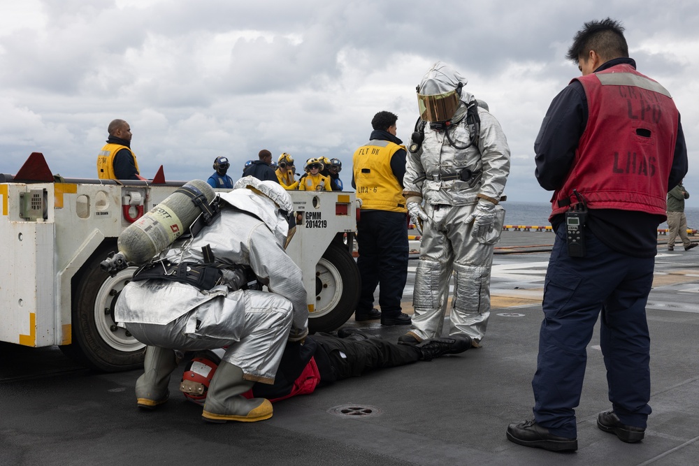 Marines, Sailors conduct flight deck firefighting training aboard USS America