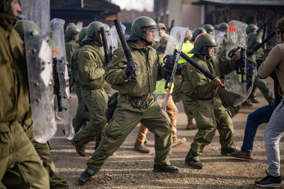 Advancing on Rioters