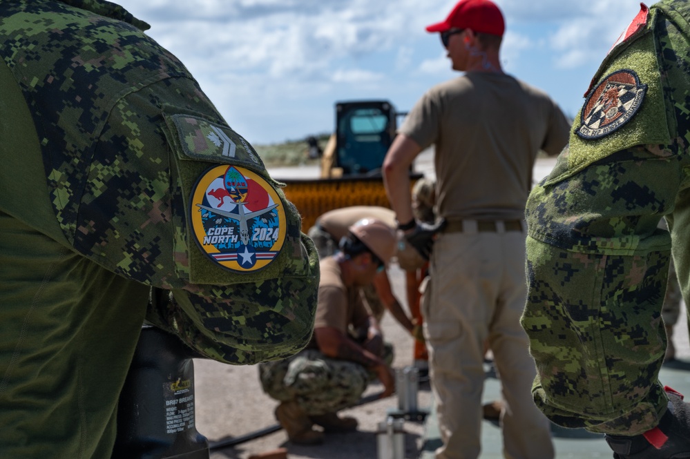 Cope North 24: U.S., RCAF engineers install AM-2 matting