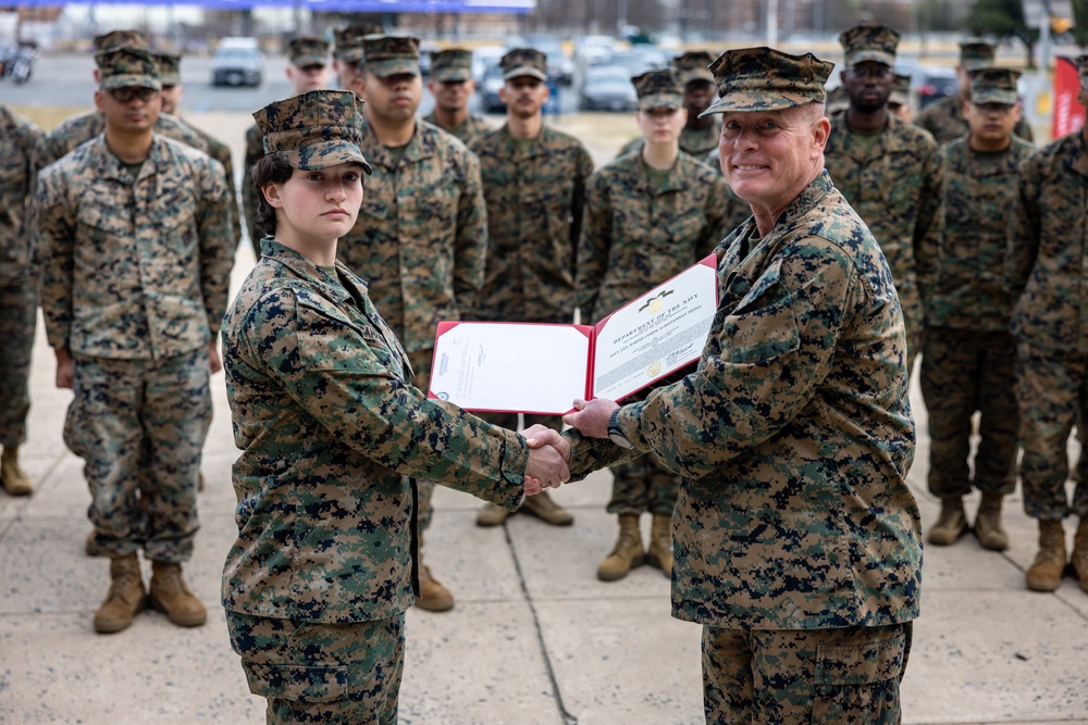 Lance Cpl. Marina Camponescki receives the Marine Corps Installations Command Marine of the Year award