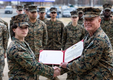 Lance Cpl. Marina Camponescki receives the Marine Corps Installations Command Marine of the Year award