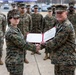 Lance Cpl. Marina Camponescki receives the Marine Corps Installations Command Marine of the Year award