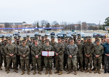 Lance Cpl. Marina Camponescki receives the Marine Corps Installations Command Marine of the Year award