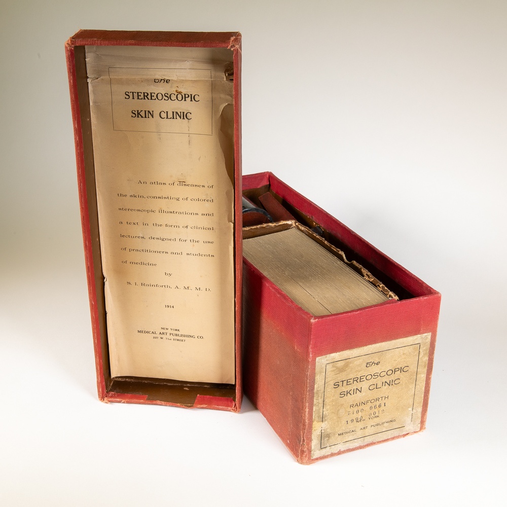 Stereoscopic card set, with stereoscope, called ‘The Stereoscopic Skin Clinic.’