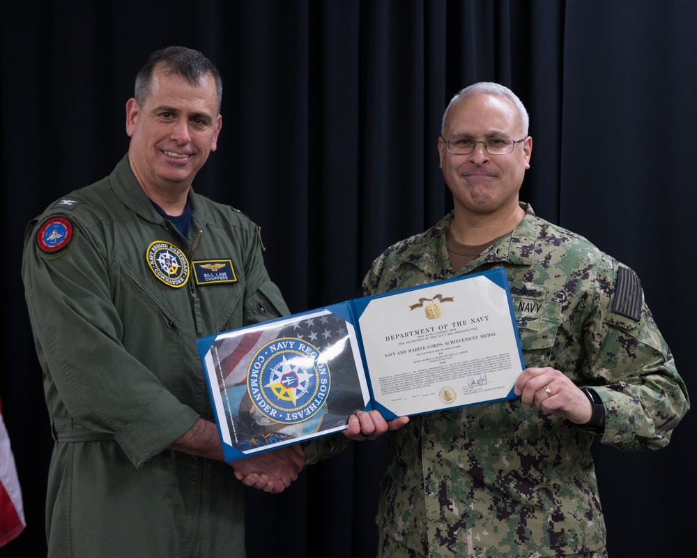 Captain William Lane Presents Musician 1st Class Tony Carter Navy Marine Corp Achievement Medal Award