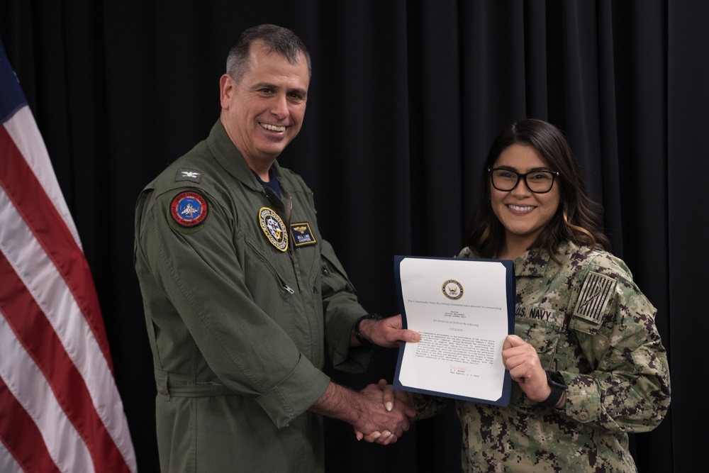 Captain William Lane Presents Musician 3rd Class Nicole Maldonado Flag Letter of Commendation