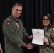 Captain William Lane Presents Musician 3rd Class Nicole Maldonado Flag Letter of Commendation