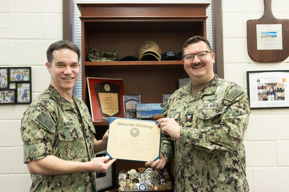 Lieutenant Nicholas Nadal Reenlists Musician 2nd Class Adam Byars