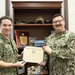 Lieutenant Nicholas Nadal Reenlists Musician 2nd Class Adam Byars