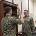 Lieutenant Nicholas Nadal Reenlists Musician 2nd Class Adam Byars