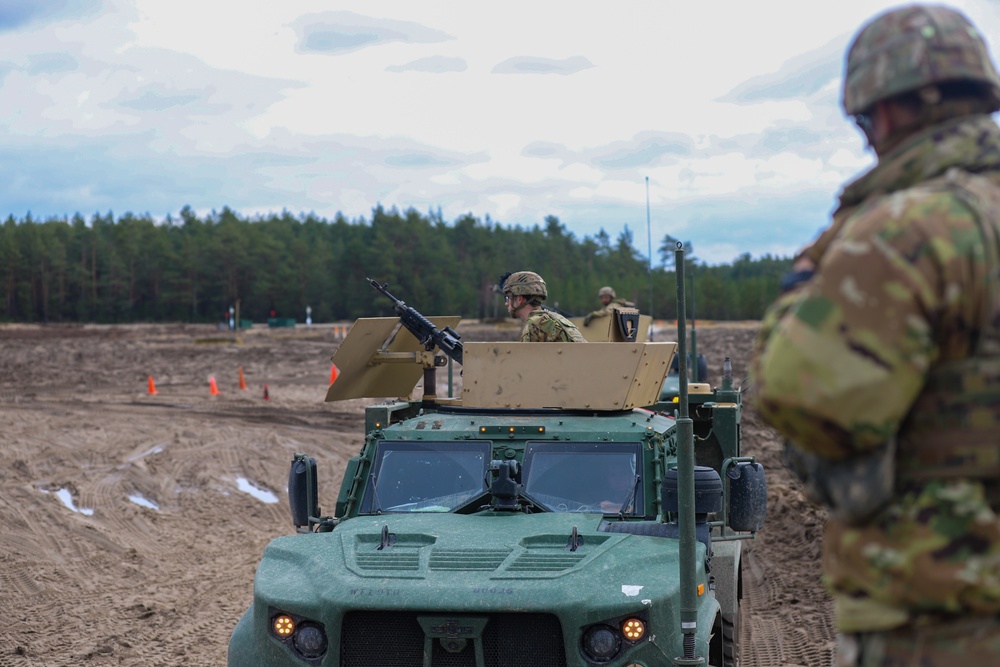 Task Force Provider Soldiers execute a convoy live fire exercise