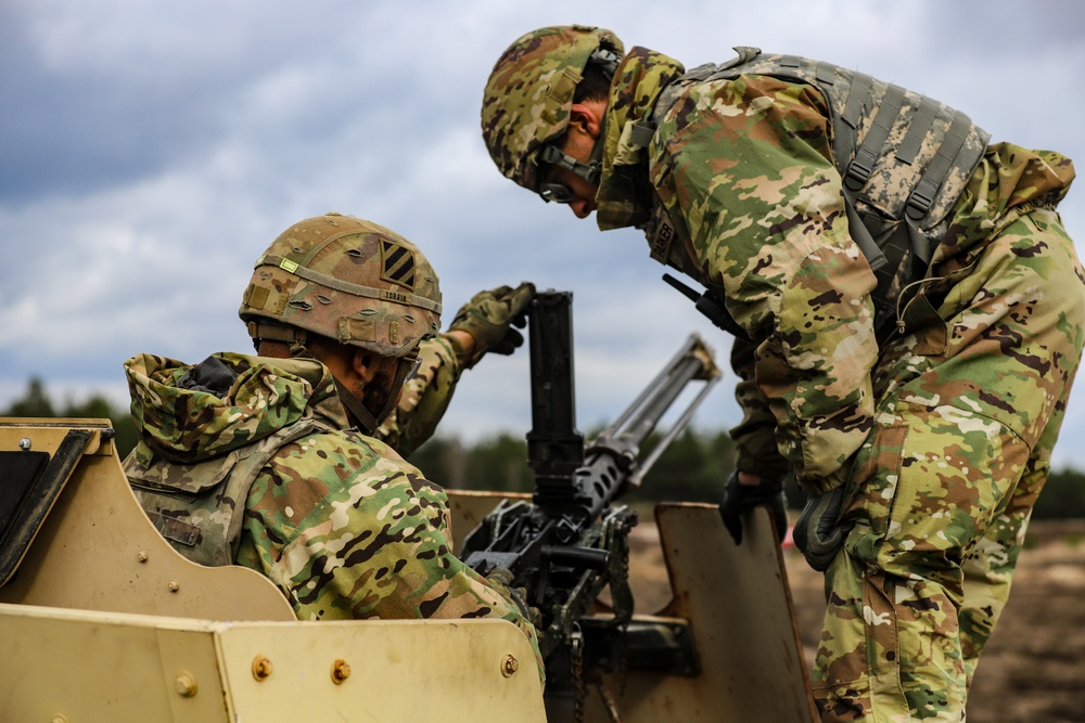 Task Force Provider Soldiers execute a convoy live fire exercise