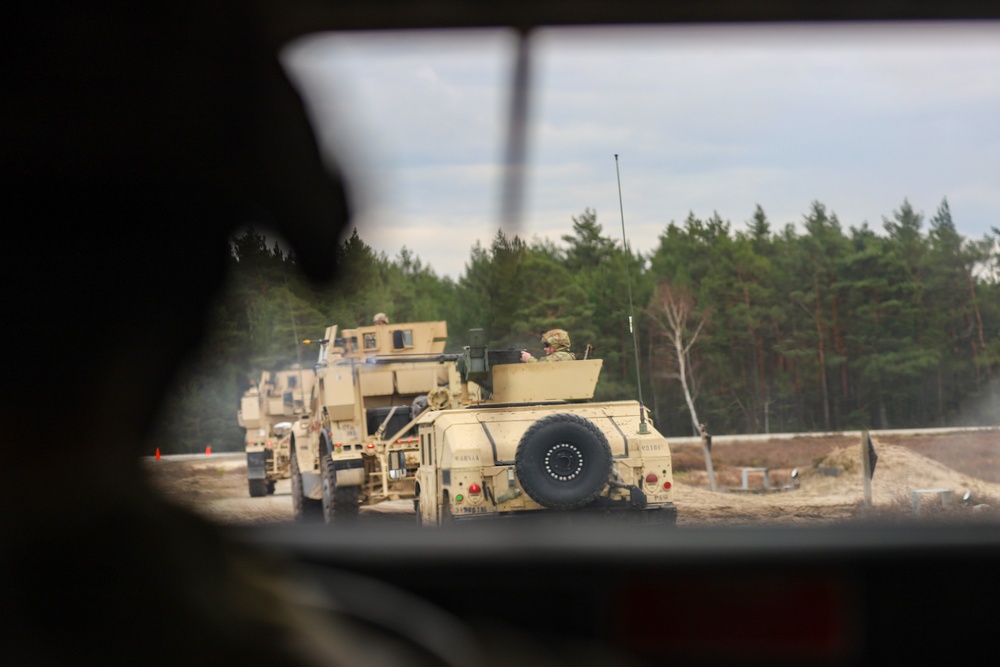 Task Force Provider Soldiers execute a convoy live fire exercise