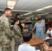 TR Sailors Visit with JMGES Students in Guam