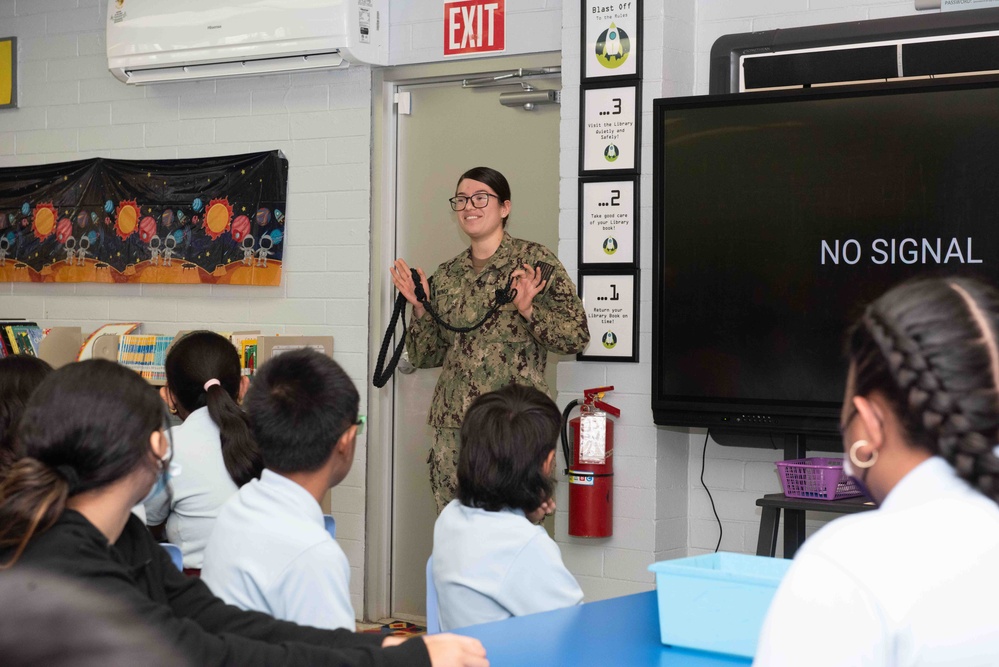 TR Sailors Visit with JMGES Students in Guam