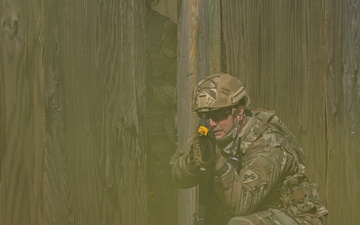 CA soldiers provides security during urban assault challenge