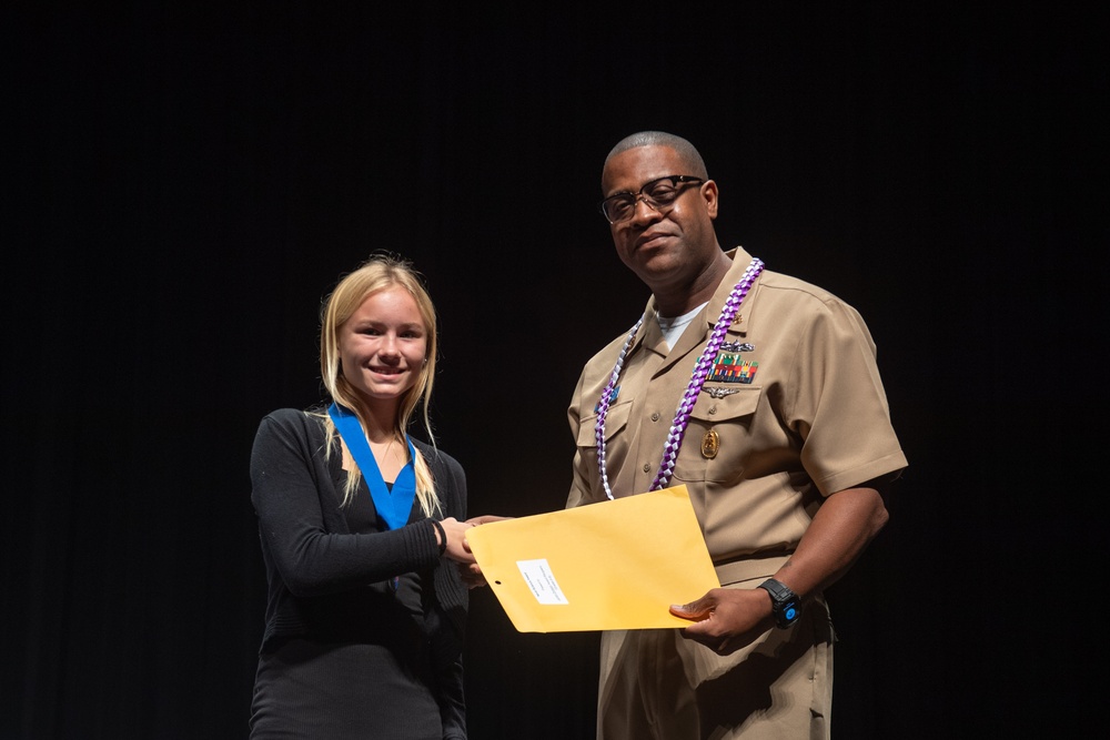 Pacific Missile Range Facility (PMRF) Presents the Naval Science Award to  Students at the Kauai Regional Science and Engineering Fair.