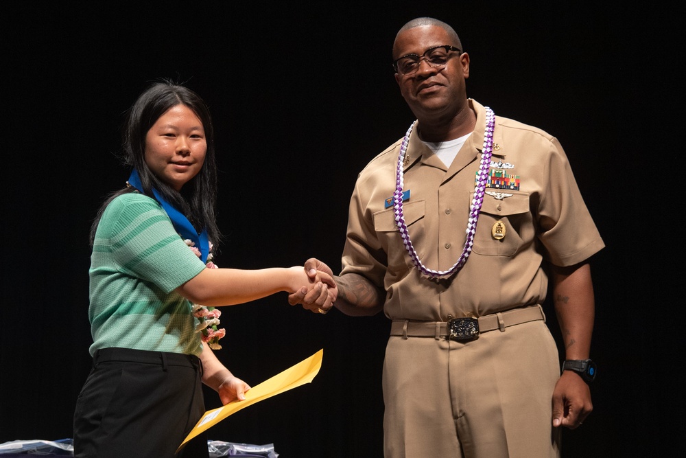 Pacific Missile Range Facility (PMRF) Presents the Naval Science Award to  Students at the Kauai Regional Science and Engineering Fair.