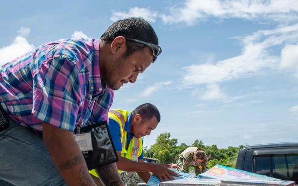 JRM Delivers Books to Yap