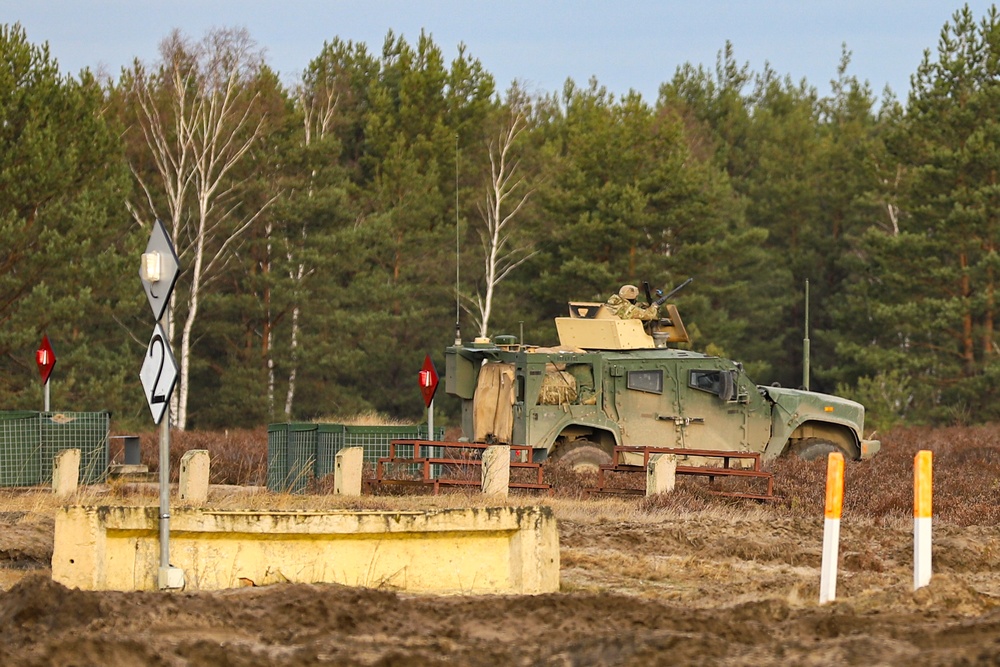 Task Force Provider Soldiers participate in a convoy live fire exercise