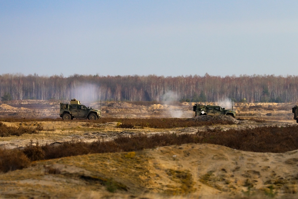 Task Force Provider Soldiers participate in a convoy live fire exercise